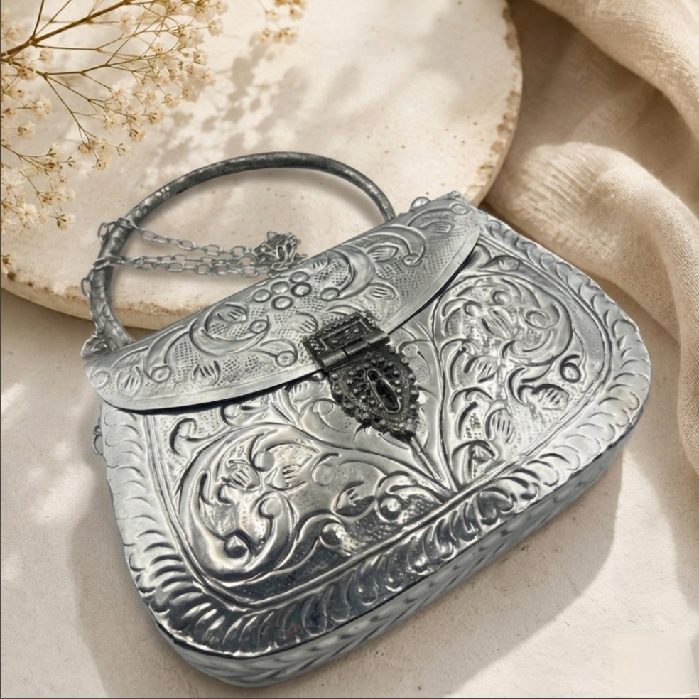 German silver sling with handle