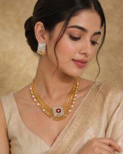 Golden necklace with matching studs