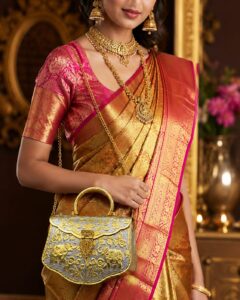 Dual tone elephant designed sling bag