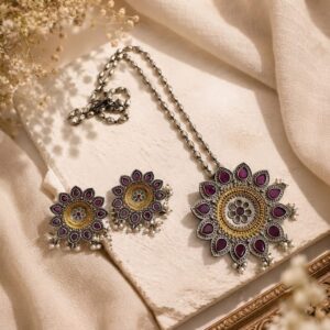 Dual tone floral designed pendant set